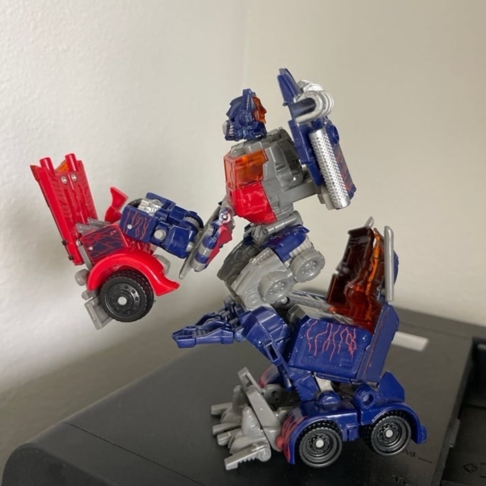 Hasbro Transforming Robot - Red, Blue, and Silver